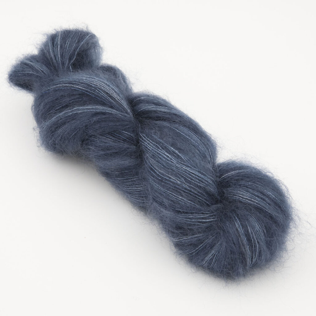navy colourway, skein of fluffy kid mohair and silk laceweight yarn