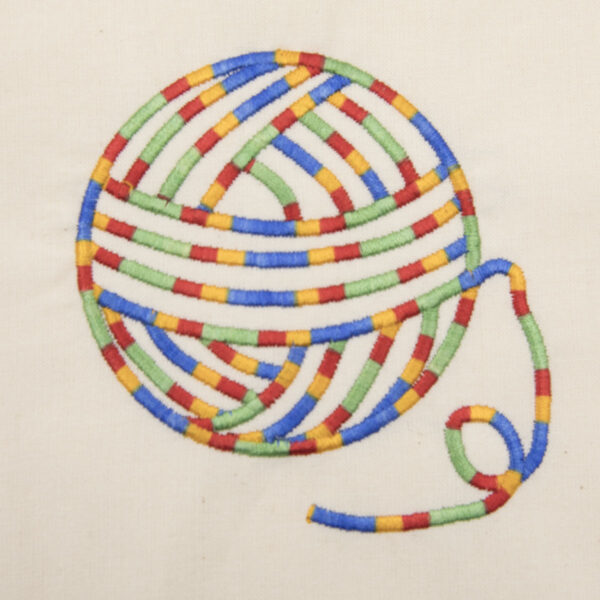 multicoloured embroidered ball of yarn