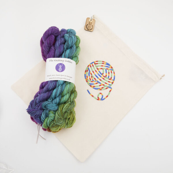 drawstring bag with multicoloured embroidered ball of yarn