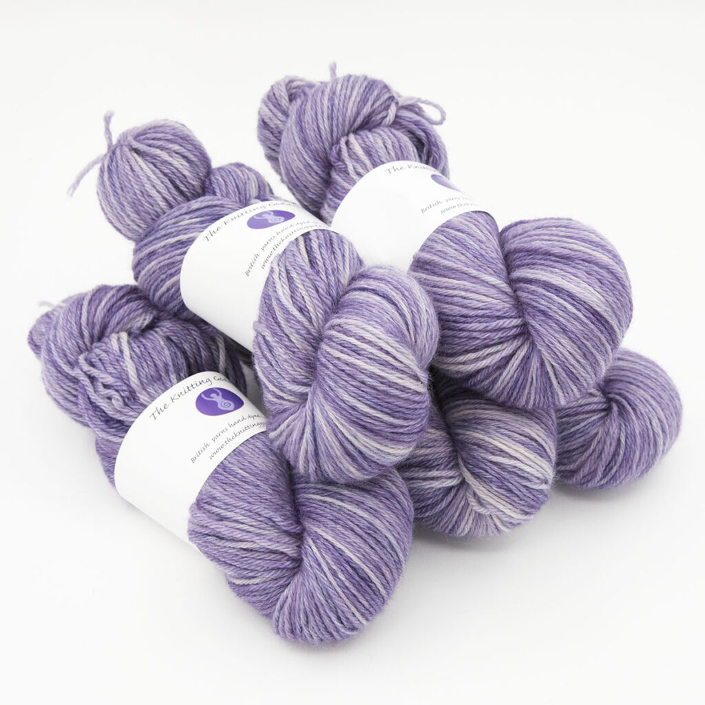 Violet hand dyed skeins of DK Blue Faced Leicester wool