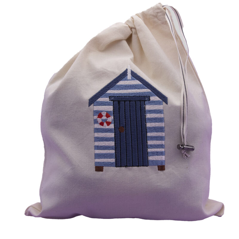 embroidered drawstring bag with beach hut design