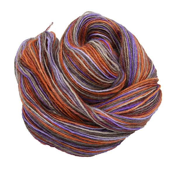 Skein of hand dyed yarn in elegantly rusted (copper, purple and brown)