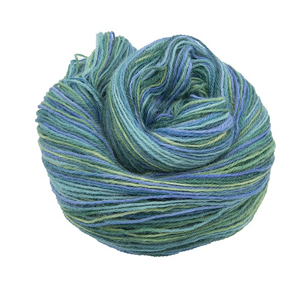 Skein of hand dyed yarn in lavender field (greens and blue)