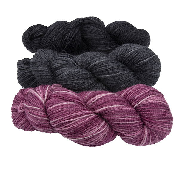 three skeins of hand dyed yarn - silver rose, charcoal and black