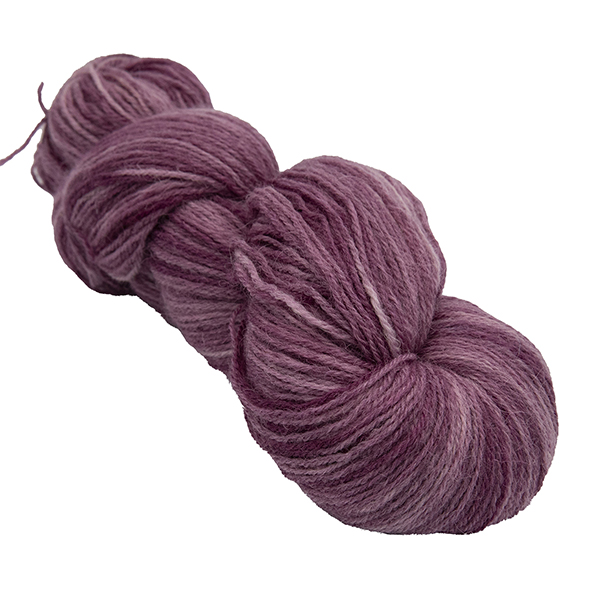skein of plum colour hand dyed Britsock yarn from The Knitting Goddess