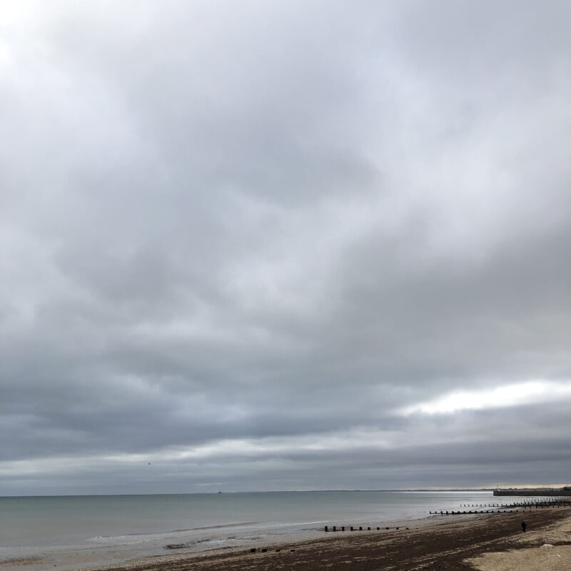 beach, sea and sky on an overcast day