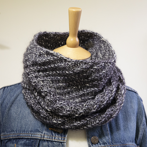 grey knitted cowl on a mannequin