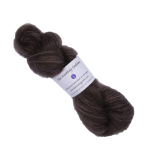 skein of hand dyed fluffy yarn in chocolate
