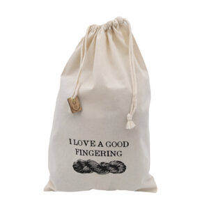 cream cotton drawstring bag with screen print design. Design is of a skein of yarn with the words I LOVE A GOOD FINGERING and is printed in black.Drawstring is closed