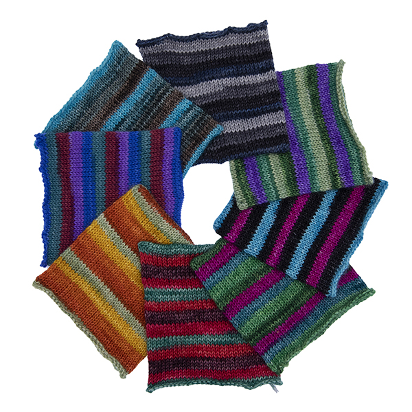 8 swatches of self striping sock yarn arranged in overlapping circle