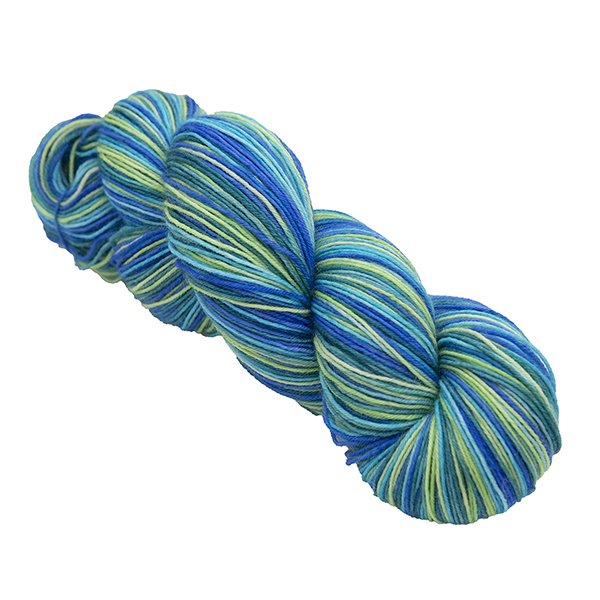 skein of green ocean self striping yarn with jade, lime, turquoise and blue hand dyed by The Knitting Goddess