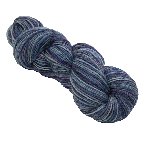 skein of hand dyed britsock yarn in misty and murky with slate blue, teal green and muted purple