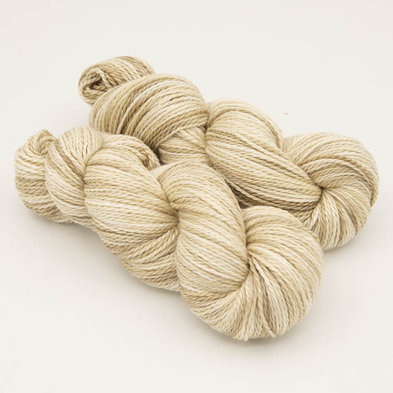 Two skeins of silky mocha yarn for skint skeins, plied