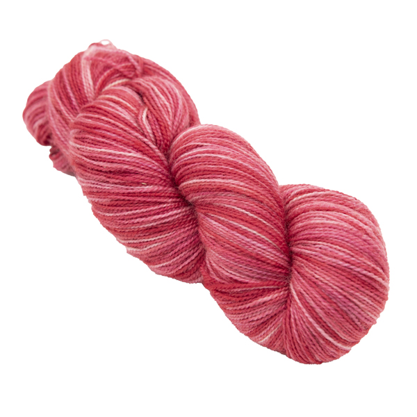 skein of hand dyed red sock yarn