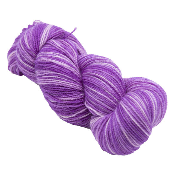 skein of hand dyed pinkish purple sock yarn