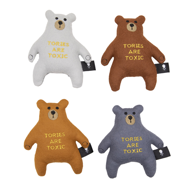four felt bears embroidered with text TORIES ARE TOXIC