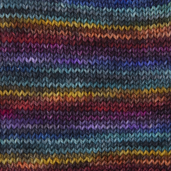 Close up view, swatch showing stripes of black rainbow colours, a round or two of each