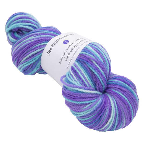 hand dyed DK sock yarn in purple and turquoise with The Knitting Goddess ball band