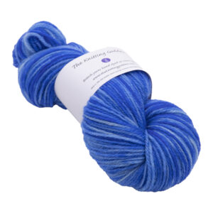 hand dyed DK sock yarn in blue with The Knitting Goddess ball band