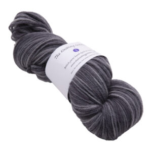 hand dyed DK sock yarn in dark grey with The Knitting Goddess ball band