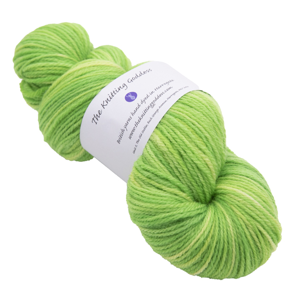 hand dyed DK sock yarn in lime with The Knitting Goddess ball band