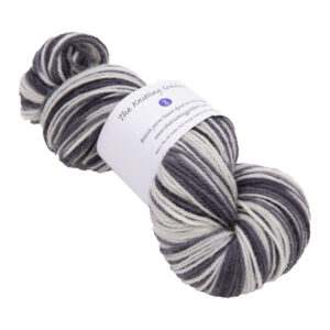hand dyed DK sock yarn in pearl and black with The Knitting Goddess ball band