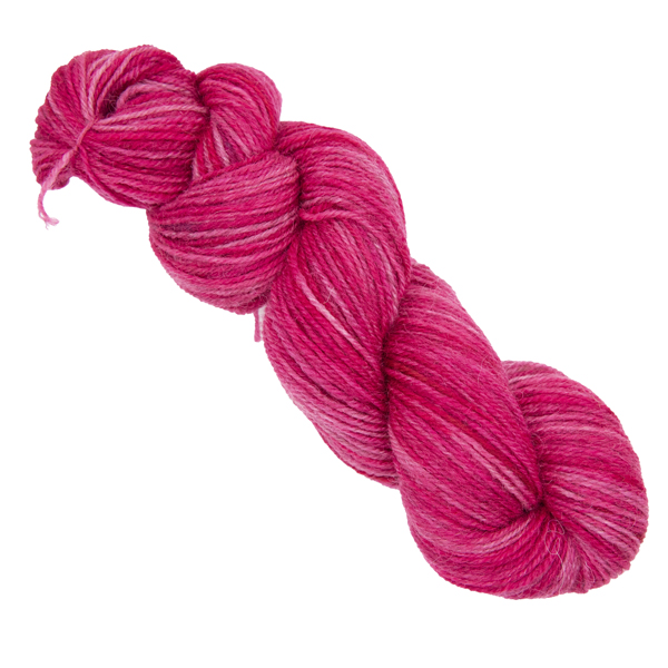 pinkish red skein of hand dyed yarn