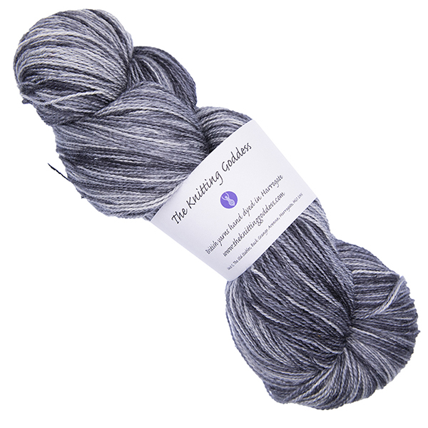 elephant grey skein of hand dyed wool and silk yarn with The Knitting Goddess ball band