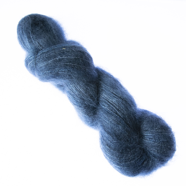 Navy hand dyed fluffy mohair silk yarn in a skein