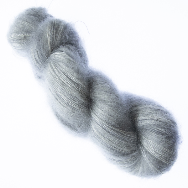 Pearl hand dyed fluffy mohair silk yarn in a skein