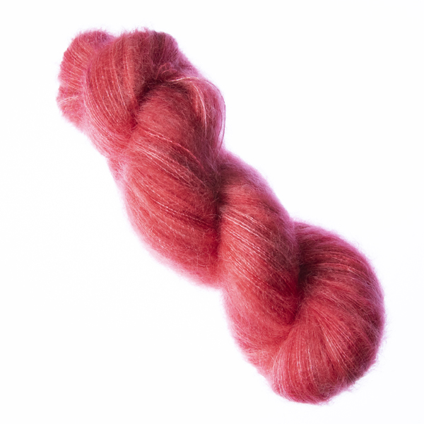 Red hand dyed fluffy mohair silk yarn in a skein