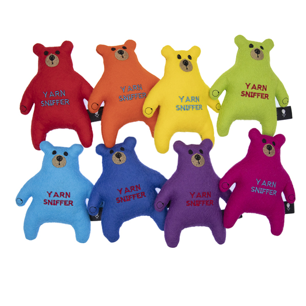 eight bears, each a different rainbow colour embroidered with the text "YARN SNIFFER"