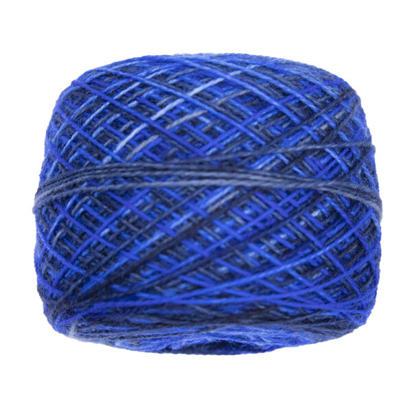 blue and navy self striping sock yarn in yarn cake, view from the side