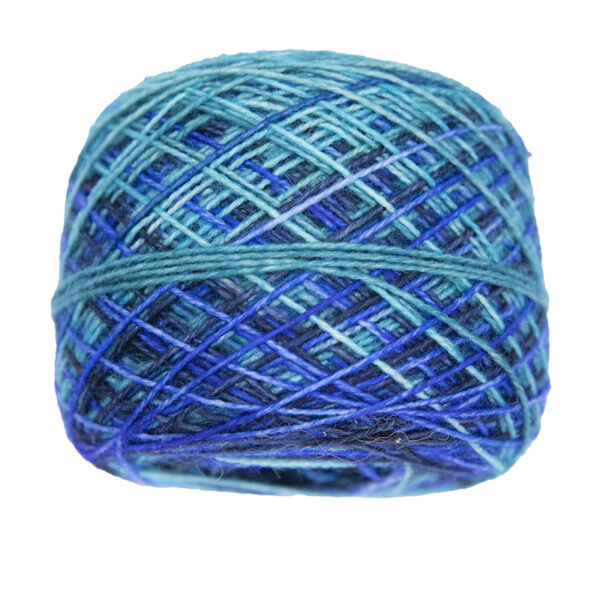 turquoise, navy, green and blue self striping sock yarn in yarn cake, view from the side