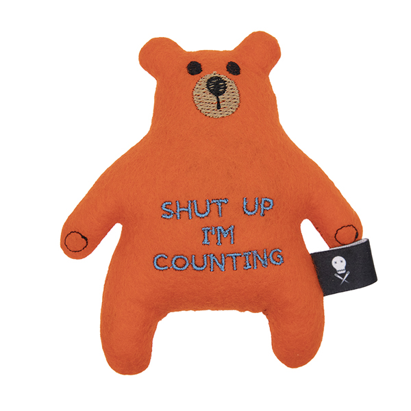 orange felt bear embroidered with the text "SHUT UP I'M COUNTING"