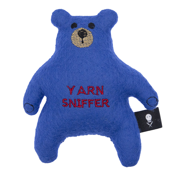 blue felt bear embroidered with the text "YARN SNIFFER"