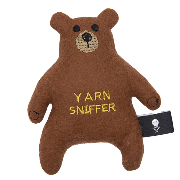 brown felt bear embroidered with the text "YARN SNIFFER"