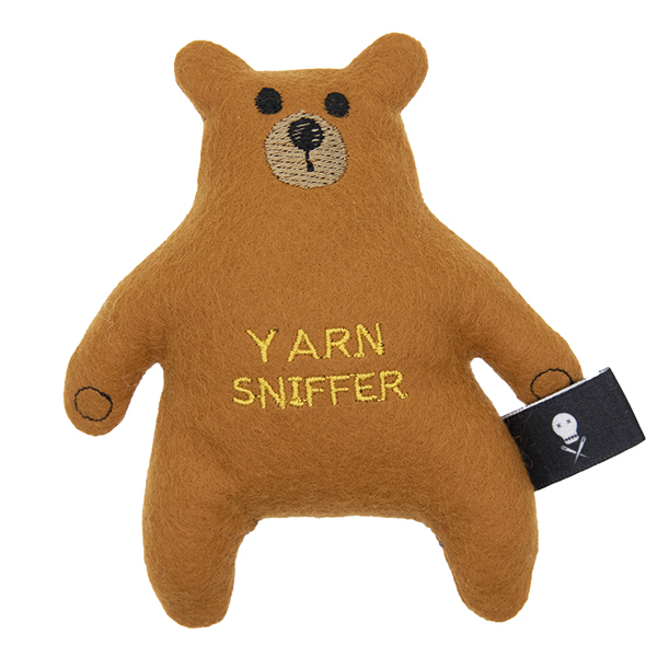 caramel felt bear embroidered with the text "YARN SNIFFER"