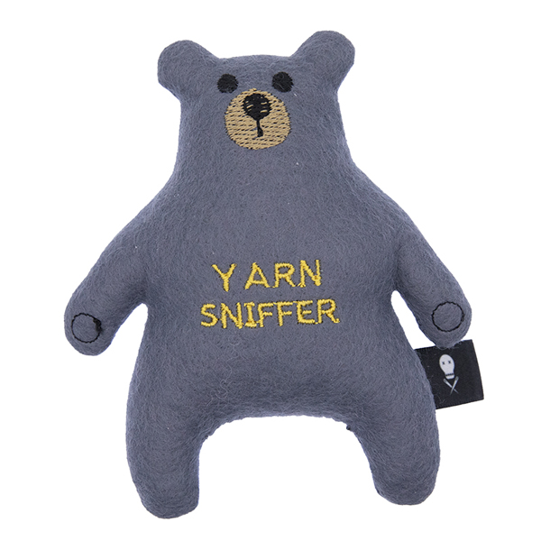 charcoal felt bear embroidered with the text "YARN SNIFFER"