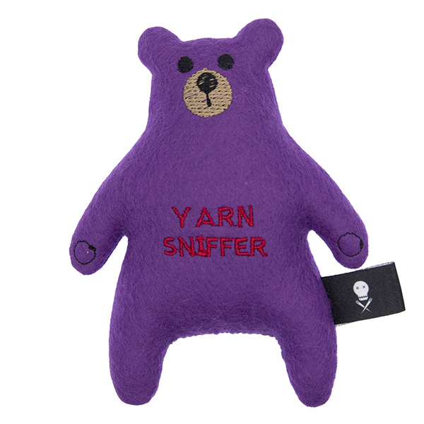 purple felt bear embroidered with the text "YARN SNIFFER"
