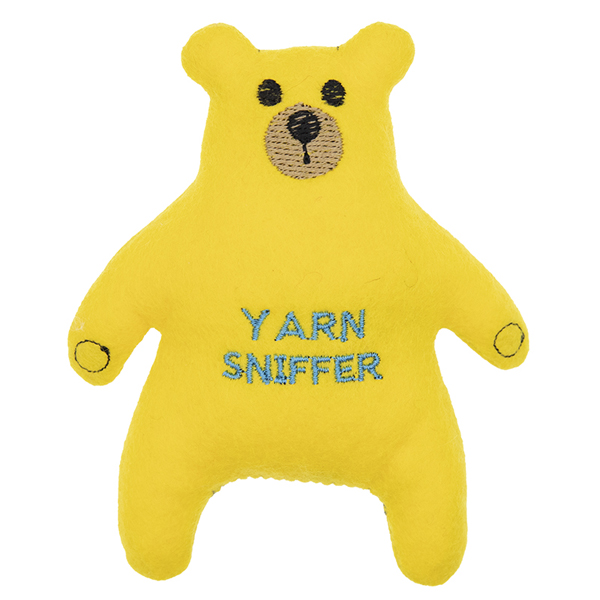 yellow felt bear embroidered with the text "YARN SNIFFER"