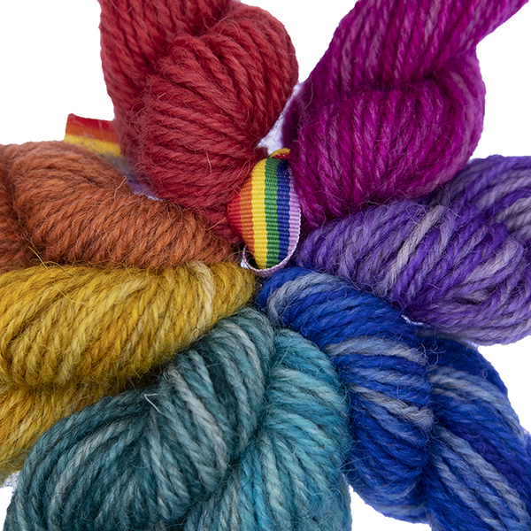 close up of 8 mini skeins in pride rainbow colours