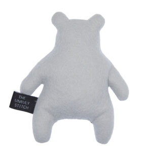back view of silver felt plush bear with The Unruly Stitch label