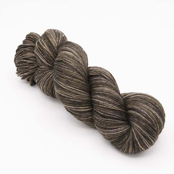 skein of hand dyed blackened walnut brown yarn