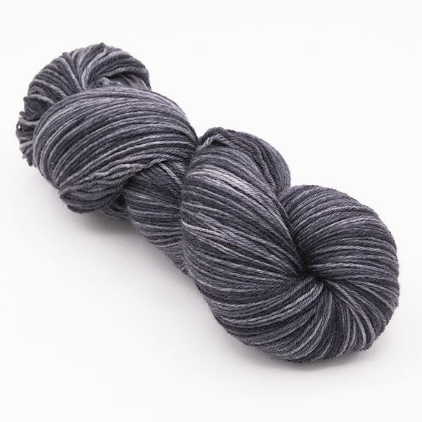 skein of hand dyed charcoal grey yarn