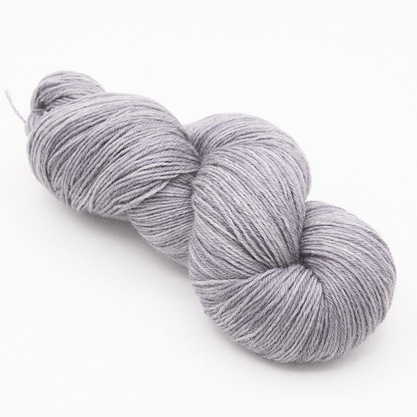 skein of hand dyed silver yarn