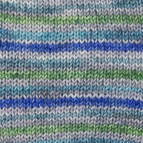 close up of knitted sample of self striping sock yarn with greens, blues and silver