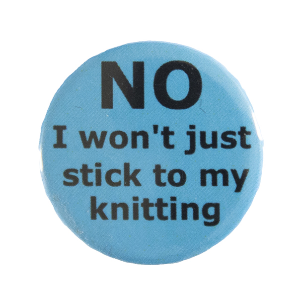 blue pin badge with text "NO I won't just stick to my knitting"