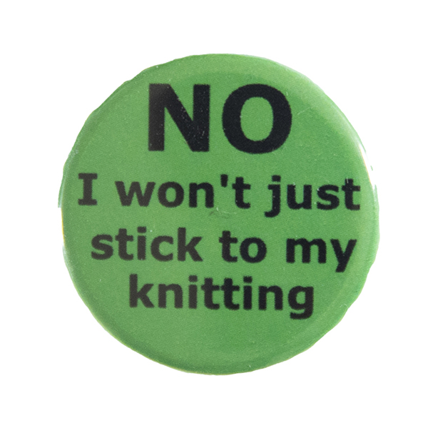 green pin badge with text "NO I won't just stick to my knitting"