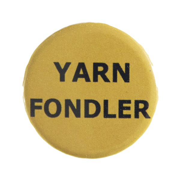 yellow pin badge with text "YARN FONDLER"